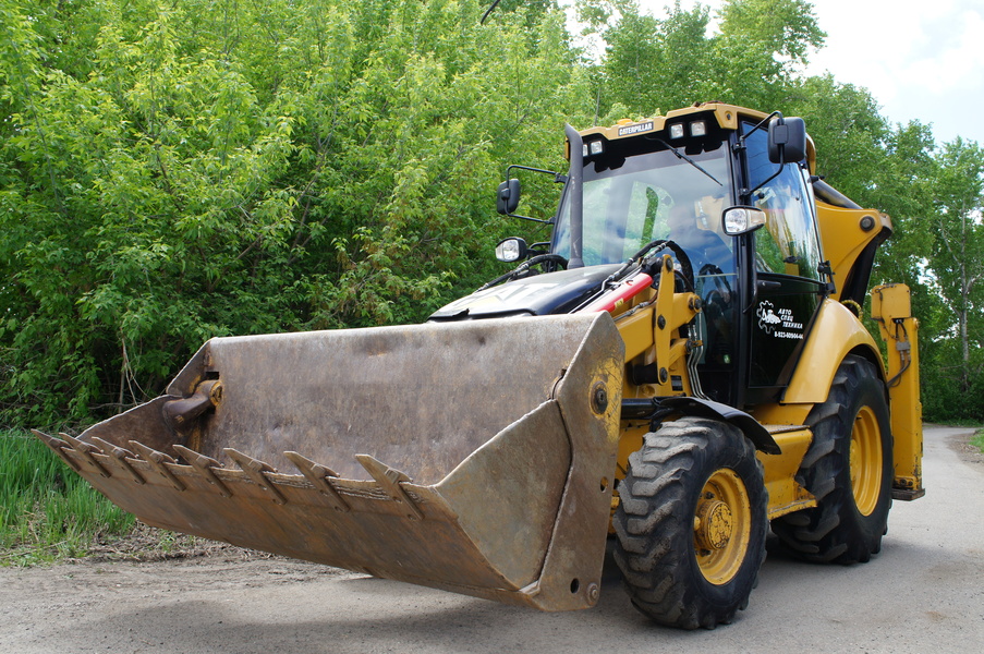 Экскаватор-погрузчик Caterpillar 428E (колесный, телескопическая стрела)}