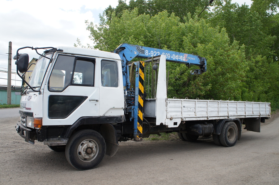 Эвакуатор Mitsubishi Fuso Fighter  }