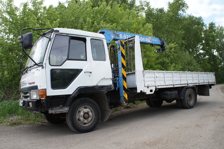 Эвакуатор Mitsubishi Fuso Fighter  }